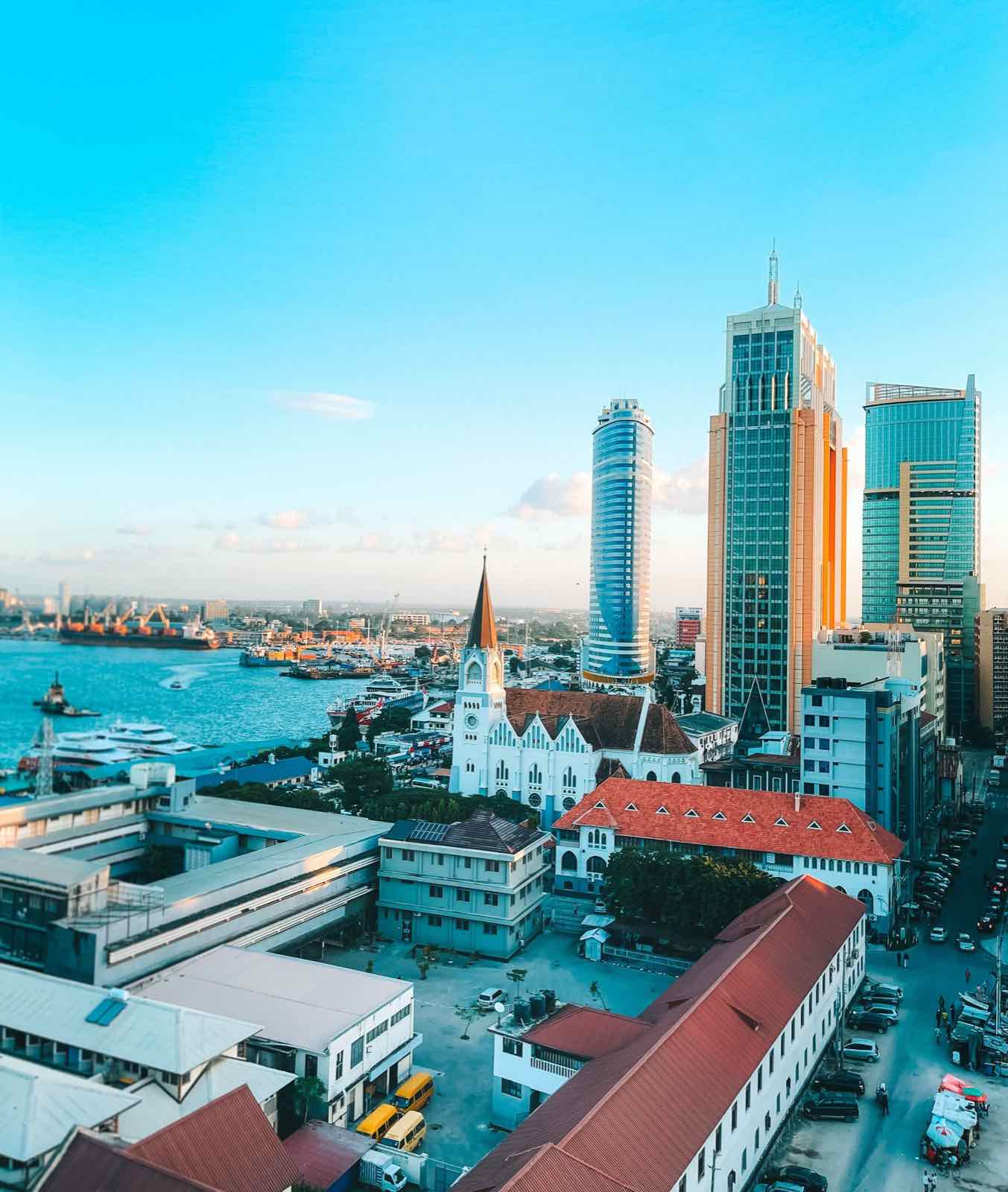 Dar es Salaam harbour and city towers at golden hour